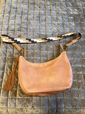 Moda Luxe Pebbled Tan Crossbody with Patterned Strap and Tassel